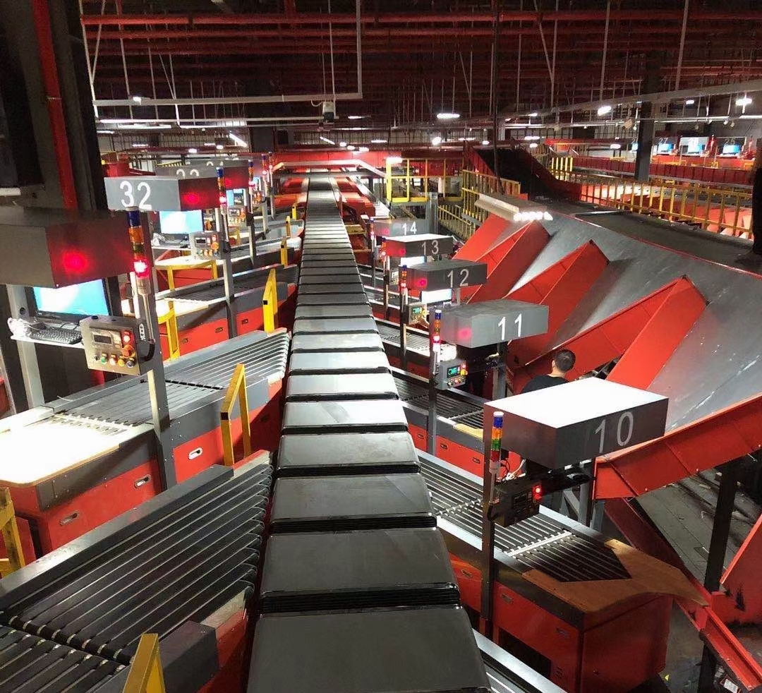 Truelisort Double Ring Sorter Logistics Transport High Speed Belt Conveyor Ring Cross Belt Cross Belt Sorter E Commerce Automatic Sorter