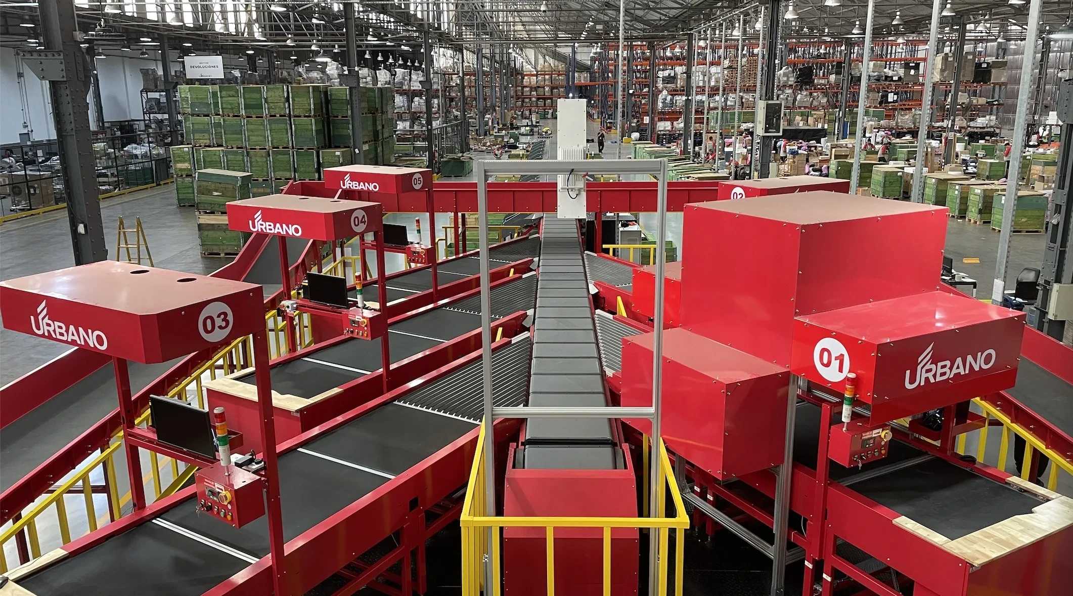 TR500-1100 Cross Belt Sorter featuring 1100mm chutes and linear motor sorting system for gentle handling.