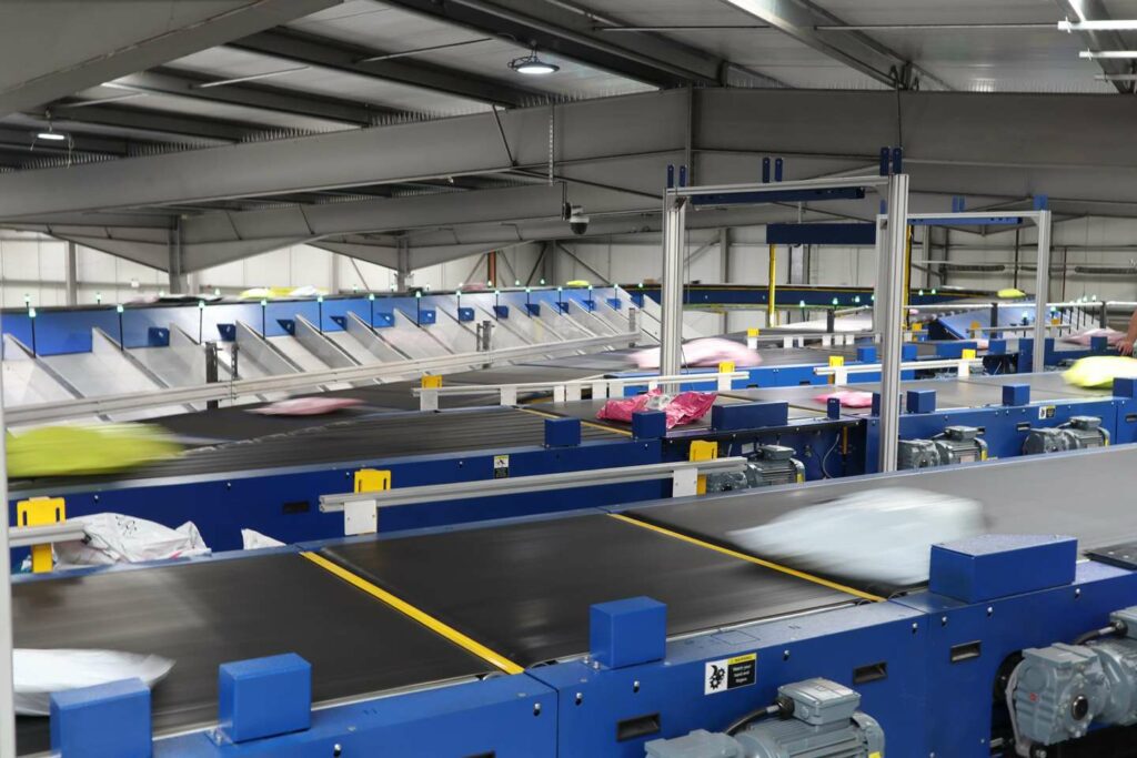 The “Anchor of Stability” in E-Commerce Mega Sales: Why Cross Belt Sorters Have Become a Warehouse Standard